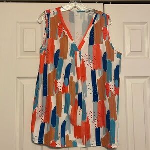 Sleeveless multi-colored top. Matches anything.